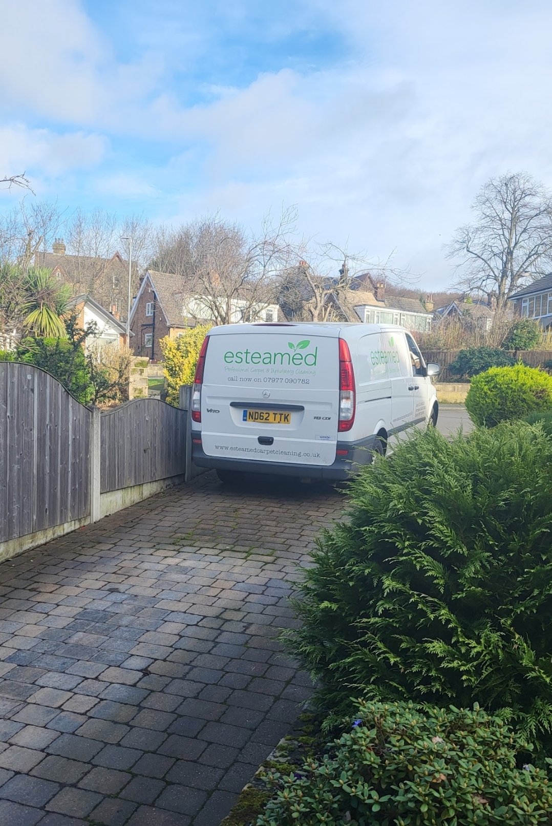 Esteamed van reversing into a Horsforth driveway on a sunny day