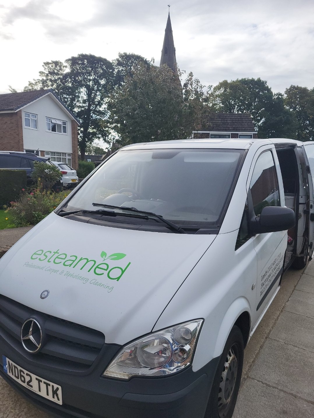 Front view of the Esteamed carpet cleaning van in a Horsforth neighbourhood